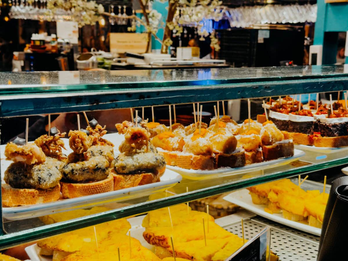 Spanish tapas displayed in a bar.