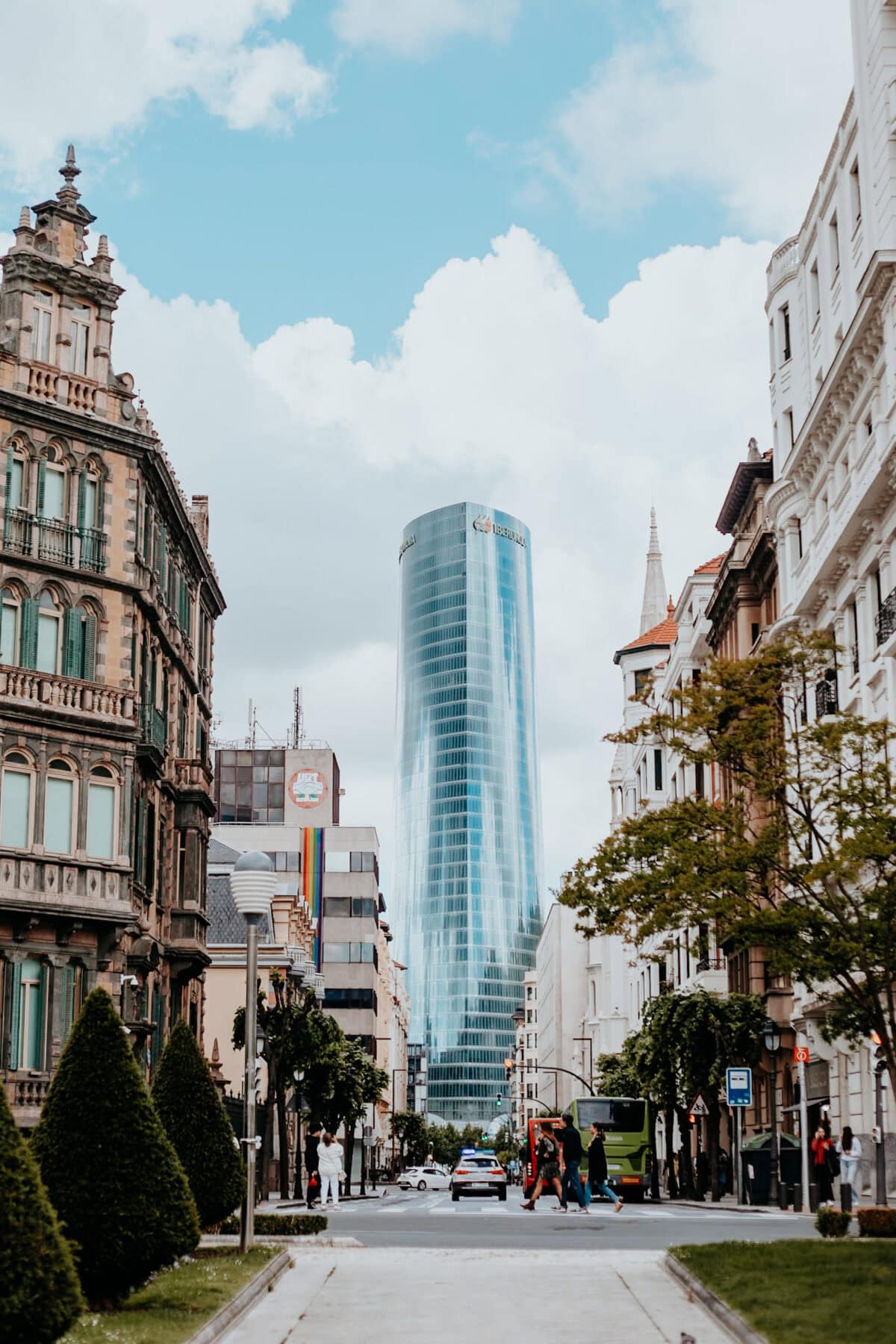 Modern and historic architecture in an urban street.