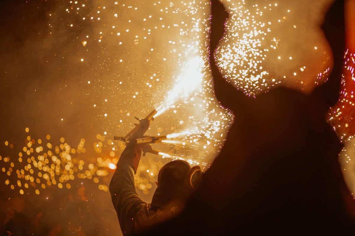 Fireworks sparkle in the night.