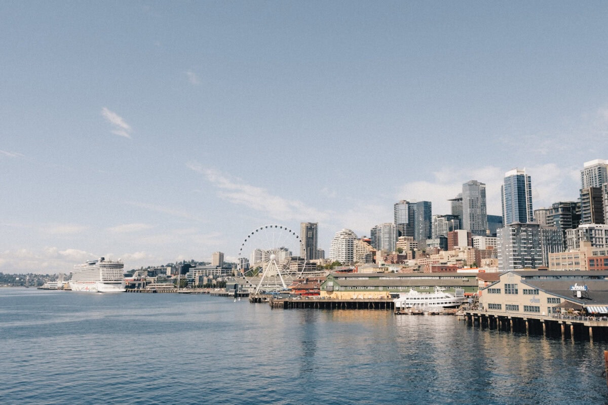 City waterfront with skyscrapers and cruise ship