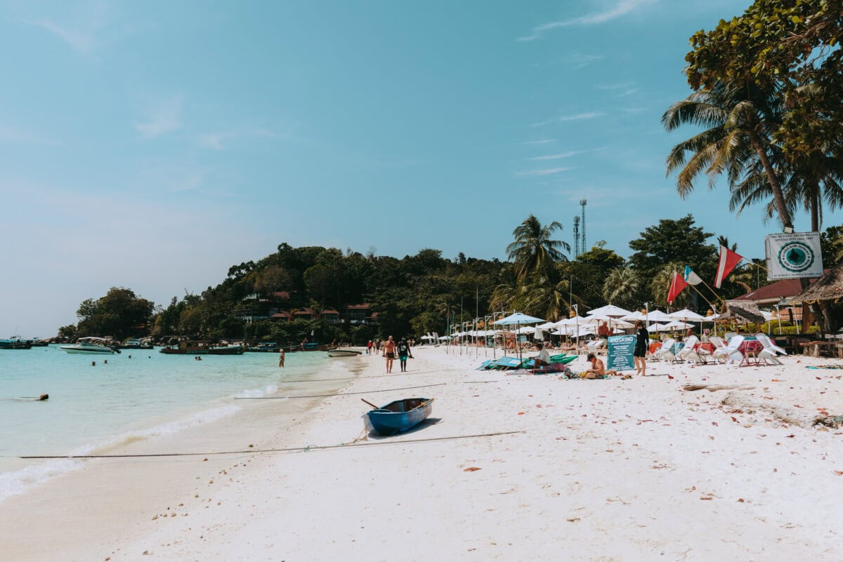 Tropical beach with palm trees and turquoise sea