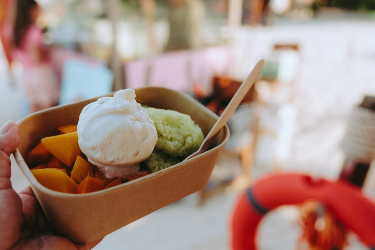 Mango with sticky rice and coconut ice cream in a cup