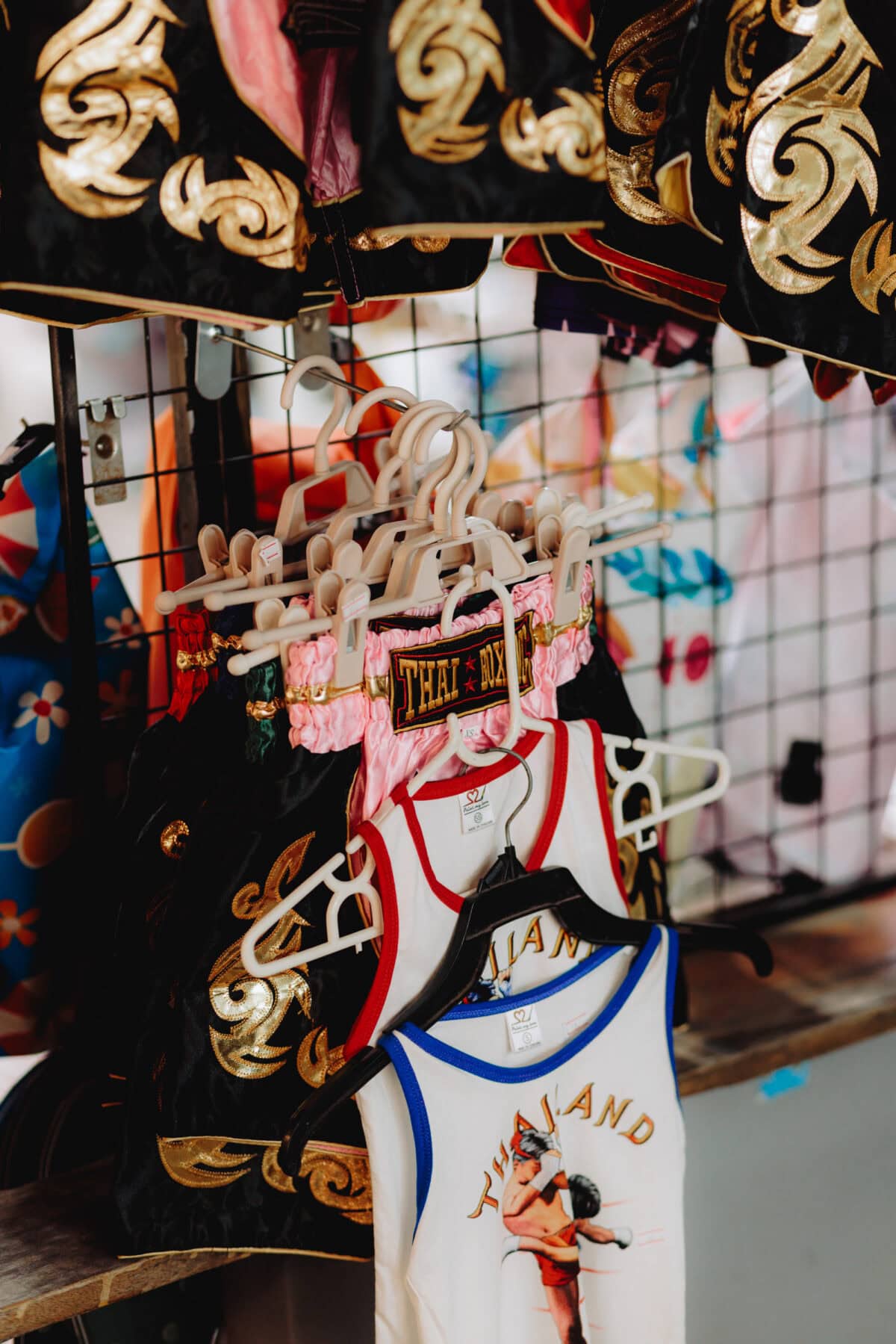 Boxing clothing on clothes racks in the store